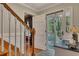 Warm foyer featuring hardwood floors and a view of the outdoor greenery at 6380 Concord Rd, Cumming, GA 30028