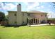 Large backyard with a screened-in porch and wooden deck at 1455 Duren Farms Dr, Lithonia, GA 30058