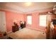 Cozy bedroom with natural light, warm colors and ample storage at 1455 Duren Farms Dr, Lithonia, GA 30058
