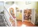 Inviting foyer with high ceilings, a staircase, and a view into the formal living area at 1455 Duren Farms Dr, Lithonia, GA 30058