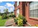 Charming front door view with well-maintained brick exterior and professionally landscaped yard at 1455 Duren Farms Dr, Lithonia, GA 30058