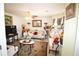 The beautifully decorated living room has two sofas and lots of flowers and decorations at 1455 Duren Farms Dr, Lithonia, GA 30058