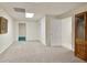 Finished basement with plush carpeting and ample open space at 755 Creek Wind Ct, Johns Creek, GA 30097