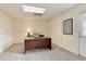 Home office with carpeting, a large desk, and natural light at 755 Creek Wind Ct, Johns Creek, GA 30097