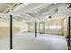 Spacious basement with clean, painted floors at 104 Southfork Dr, Woodstock, GA 30189