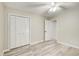 Bedroom featuring a ceiling fan and closet at 104 Southfork Dr, Woodstock, GA 30189