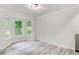 Bright dining area featuring a bay window and hardwood floors at 104 Southfork Dr, Woodstock, GA 30189