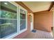 Cozy front porch area with wood floors and lots of sunlight at 104 Southfork Dr, Woodstock, GA 30189