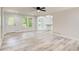 Bright, open-concept living room featuring hardwood floors and modern design at 104 Southfork Dr, Woodstock, GA 30189