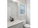 Clean bathroom featuring vanity, a mirror and natural light from the window at 3131 Stonegate Sw Dr, Atlanta, GA 30331