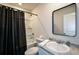 Modern bathroom with vanity, mirror, toilet, and shower with curtain at 428 Whitetail Cir, Canton, GA 30115