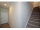 Inviting entryway featuring a staircase and hardwood flooring for a modern look at 428 Whitetail Cir, Canton, GA 30115