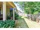 Spacious backyard featuring lush green grass and a wooden fence creating a private and serene outdoor space at 2436 Loughridge Dr, Buford, GA 30519