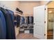 Walk-in closet featuring wire shelving and built in shoe rack at 2436 Loughridge Dr, Buford, GA 30519
