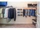 Walk-in closet featuring wire shelving for clothes, shoes and storage at 2436 Loughridge Dr, Buford, GA 30519