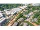 Overhead shot of townhomes in an urban setting, mixed with greenery and commercial zones at 655 Mead Se St # 3, Atlanta, GA 30312