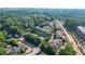 An aerial view captures the neighborhood's layout amidst green foliage, highlighting its serene setting at 655 Mead Se St # 3, Atlanta, GA 30312