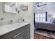 Bathroom featuring modern sink and bedroom view at 655 Mead Se St # 3, Atlanta, GA 30312
