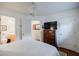 Bright bedroom with hardwood floors, ensuite bathroom, and traditional furnishings at 655 Mead Se St # 3, Atlanta, GA 30312