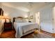 Bedroom featuring a comfortable bed, hardwood floors, and stylish decor at 655 Mead Se St # 3, Atlanta, GA 30312