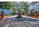 Community entrance featuring signage, mature trees, and well-maintained landscaping at 655 Mead Se St # 3, Atlanta, GA 30312