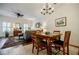 Dining area with hardwood floors, natural light, and open to living room at 655 Mead Se St # 3, Atlanta, GA 30312