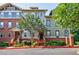 Charming townhouse exterior with brick accents and landscaped entrance at 655 Mead Se St # 3, Atlanta, GA 30312