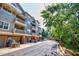 Townhome with private balconies, rear-entry garages, and landscaped surroundings at 655 Mead Se St # 3, Atlanta, GA 30312