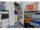 Garage features an organizational system with shelving and storage for tools and equipment at 655 Mead Se St # 3, Atlanta, GA 30312