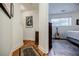 Hallway with wood floors leading to the bedroom at 655 Mead Se St # 3, Atlanta, GA 30312