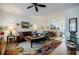 Cozy living room with hardwood floors and open concept to the dining area at 655 Mead Se St # 3, Atlanta, GA 30312