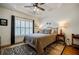 Bedroom featuring hardwood floors and tray ceiling at 655 Mead Se St # 3, Atlanta, GA 30312