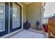Cozy patio with black door and decorative plants at 655 Mead Se St # 3, Atlanta, GA 30312