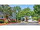 Charming street view showcasing well-maintained townhomes with inviting front entrances and lush landscaping at 655 Mead Se St # 3, Atlanta, GA 30312