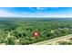 Aerial view of the property, surrounded by lush greenery and highlighting its location at 6600 N Beulah Rd, Lithia Springs, GA 30122