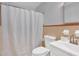 Cozy bathroom featuring a shower with white curtain and vanity sink at 6600 N Beulah Rd, Lithia Springs, GA 30122