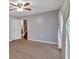 Neutral bedroom with carpet, white trim and view into hallway at 6600 N Beulah Rd, Lithia Springs, GA 30122