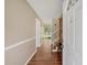 Warm and inviting foyer with hardwood floors and decorative staircase at 6600 N Beulah Rd, Lithia Springs, GA 30122
