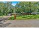 Traditional brick home with mature trees, detached garage and spacious front yard at 6600 N Beulah Rd, Lithia Springs, GA 30122