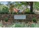 Stone entrance sign reading 'FORESTVIEW', framed by manicured landscaping, adding an elegant touch to the neighborhood at 161 Forestview Dr, Suwanee, GA 30024