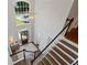 Grand foyer with high ceilings, large window, and staircase with wood and white accents at 161 Forestview Dr, Suwanee, GA 30024