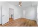 Bright bedroom offers wood floors, and white walls, creating a serene retreat at 1835 Taylor Ave, East Point, GA 30344