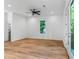 Bright and airy bedroom with hardwood floors, natural light, and access to the backyard at 1835 Taylor Ave, East Point, GA 30344