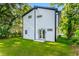 Contemporary home with black framed windows and a well-maintained backyard at 1835 Taylor Ave, East Point, GA 30344