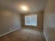 Comfortable bedroom with a large window providing plenty of natural light at 285 Fieldview Ln, Covington, GA 30016