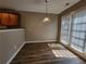 Dining area with hardwood floors and bright natural light at 285 Fieldview Ln, Covington, GA 30016
