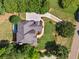 Aerial view of the home showcasing its architectural design and surrounding greenery at 3845 Overlake Dr, Cumming, GA 30041