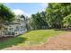 Spacious backyard featuring a well-maintained lawn and an inviting deck area at 3845 Overlake Dr, Cumming, GA 30041