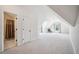 Bright bonus room with dormer windows, neutral paint and plush carpeting at 3845 Overlake Dr, Cumming, GA 30041