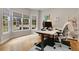 Bright office space features large windows, modern decor, and a functional white desk at 3845 Overlake Dr, Cumming, GA 30041